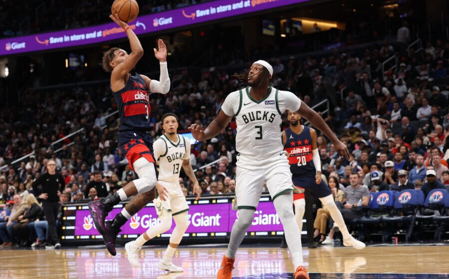 Oct 21, 2026; Washington, District of Columbia, USA; Washington Wizards guard Trae Young (3) shoots the ball as Milwaukee Bucks center Myles Turner (3) defends in the first half at Capital One Arena. Mandatory Credit: Geoff Burke-Imagn Images